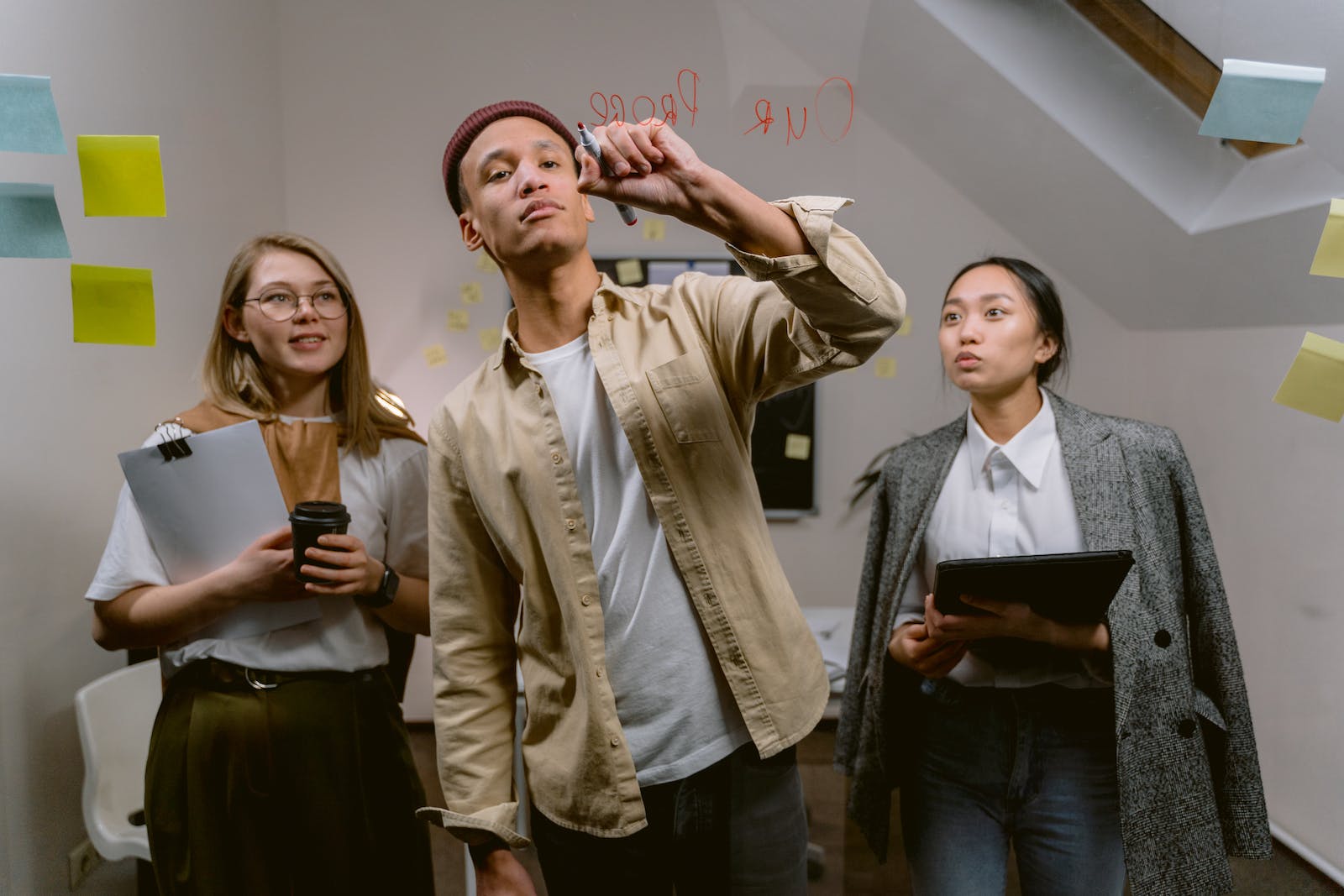A Man Writing on a Glass